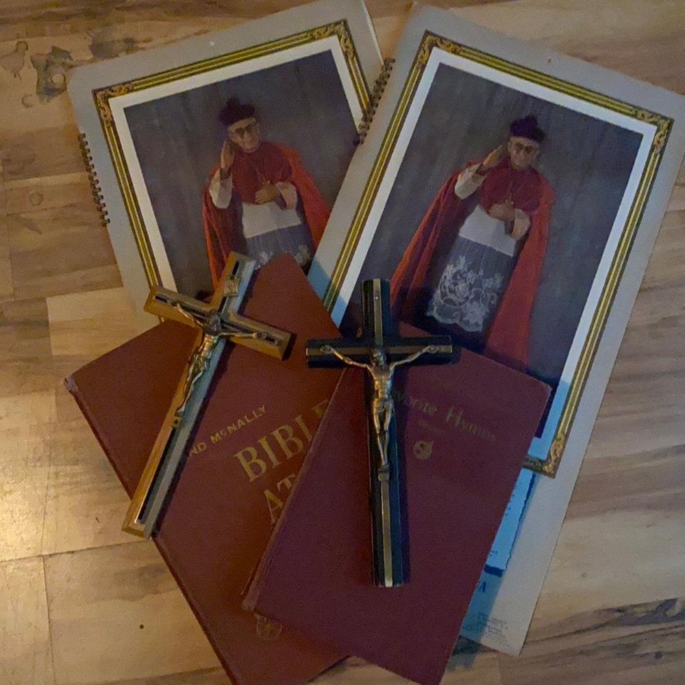1940s calendar, vintage bible , vintage religious hymn book and crucifix’s